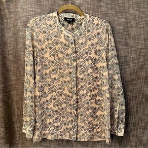 White paisley floral pattern on blush shirt. Brand: DKNY; Size: M. Slightly used